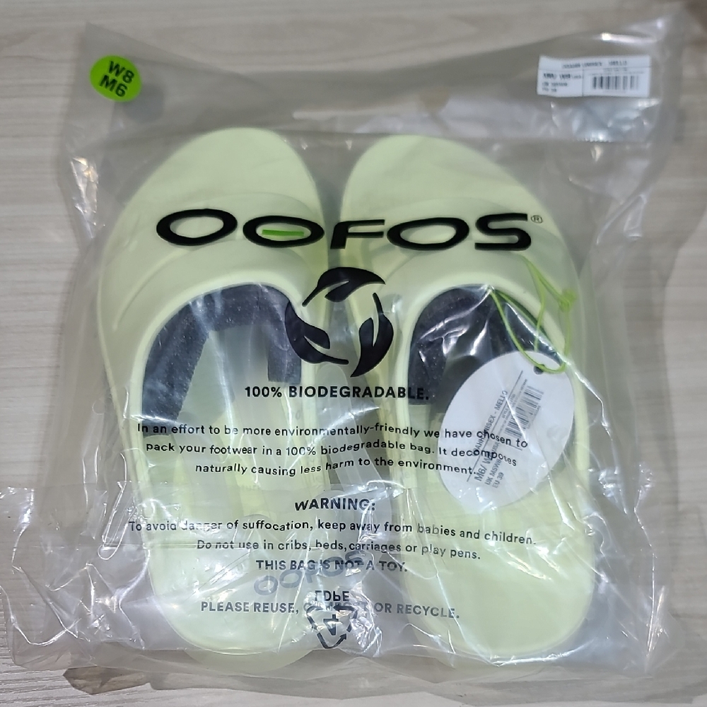 OOFOS Women’s Slide Sandals in Pale Yellow - Picture 8 of 13